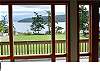 What a great lawn for croquet, badminton, and tossing a tennis ball to Fido. The deck and windows run the entire length of the living room.