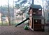 A playground is located not far from the cabins, near the edge of Boss Lake.