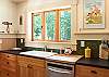 The kitchen is well equipped with all the conveniences.