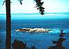 The view from Three Coves Hideaway includes whales, kayakers, fabulous sunsets, the lights of Victoria, B.C.