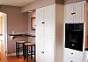 A little breakfast nook is located in the kitchen.