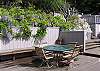 The numerous decks are bathed in sun at noon, but cool and shady on a warm summer evening.