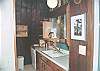 This cabin offers a full kitchen with microwave, dishwasher, free standing range/oven, double sink, and refrigerator. Dishes, utensils, cookware and a coffee maker are also provided.