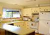 This sunny retro kitchen has all the modern conveniences
