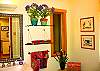 The upstairs powder room of this joyful home is colorful and perky, just like the rest of the house.