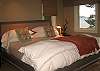 Both bedrooms have amazing views and doors to the deck. Full length mirrors also will reflect the view.