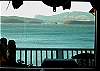 The view of the islands from the living area includes (left to right) Jones, Yellow, Wasp, Shaw, and on Orcas Deer Harbor and Turtleback Mountain, beyond.