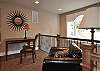 Upper landing with writing desk.