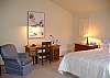 The master bedroom offers a king size bed.