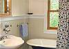 Bath vanity and tub.