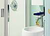A 19 inch door opens to the cheerful bathroom with shower and Italian sink.