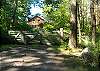Enter the gate and pass through lush vegetation &amp; gardens.
