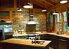 This beautiful kitchen has space for everyone to help with meal prep.