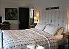 The master bedroom offers a king size bed.