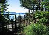 The entry garden is fenced to protect it from deer. A simple, magical landscape.