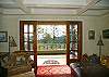 Open the exquisite French doors and bring the beauty of the island inside.
