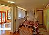 This sleeping alcove offers a third queen size bed.