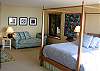 The spacious bedroom is on the lower level.