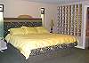 The master bedroom has a king size bed and luxurious private bath with soaking tub.