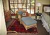 Enjoy a book in the morning light on the master bedroom chaise.