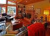 Warm and cozy living room with fireplace.