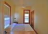 This quiet bedroom is to the left as you enter the front door.