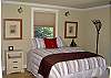 Bedroom with comfortable queen size bed.