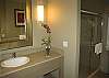 Gorgeous bathrooms with limestone vanities and huge showers.