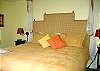 A second large bedroom on the lower floor has a king size bed as well as private waterview deck.