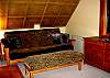 This futon in the loft folds out to create another sleeping space for overflow guests.