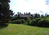 This wide side yard is perfect for a game of croquet.