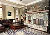 The stone fireplace at the end of the living room adds character and charm to complete this lovely room. Firewood is available upon request.