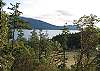 The view from the upstairs balcony &  bedrooms looks down East Sound, at Mt. Constitution. Judd Cove is to the west, Entrance Mountain beyond.
