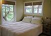 Besides a private entry, the roomy guest suite offers its own bath and quiet reading area.