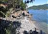 Hike down the path to this secluded cove beach at low tide.