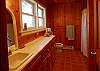 The guest suite bathroom offers a shower/tub.
