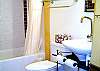 Updated bath off morning room has soaking tub.