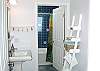 The master bath is bright and offers a washer and dryer.