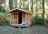 Near the picnic area is a playhouse and large flat open area where children and pets can run.