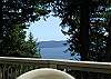 The view from the deck at Madrona House is south facing.  It looks out over Cascade Bay and East Sound.