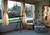Watch the fire in the fireplace or TV, or curl up with a good book in this cozy in colorful overstuffed chair. Or maybe you will catch a glimpse of an eagle or porpoise off Point Thompson through the telescope.