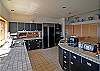 The kitchen is huge and open to the family room.