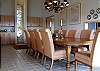 This beautiful dining room seats ten and includes a wet bar.