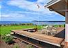 sit on the patio and enjoy a view of the sea and the bluff.