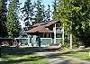 Coho Lane House is at the end of a private drive. Spacious deck is at the left &amp; can be accessed from house or front yard.