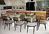 The dining table seats eight and there's also a breakfast table in the kitchen corner.