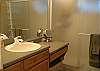 Ensuite master bathroom on the lower level.
