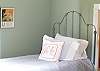 The cheerful bedroom upstairs. Kids will love this twin bed with trundle.