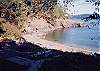 The sandy beach of Karemar Cove is a short walk down from the house.