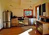 The kitchen is updated with stainless steel appliances.